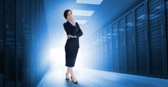 businesswoman standing in a data center